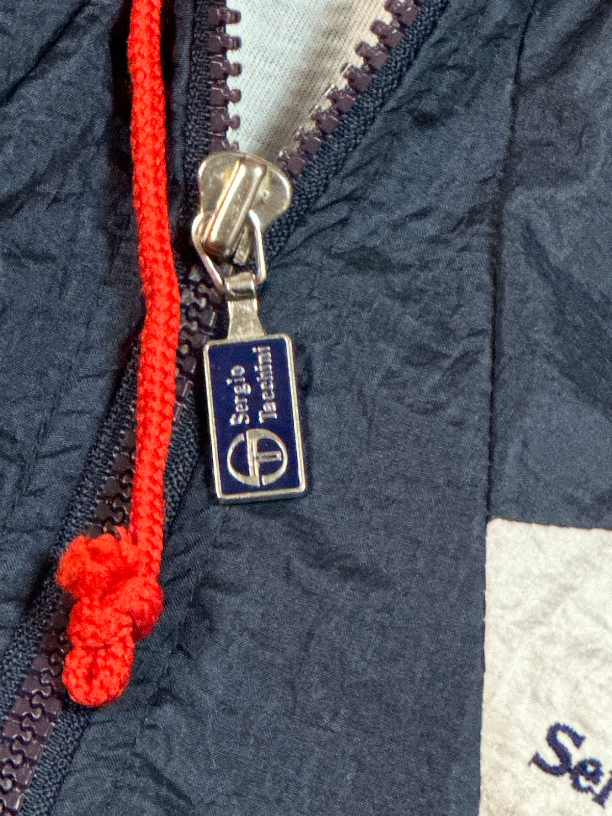 Cortaviento Sergio Tacchini